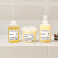 Davines DEDE Shampoo with the DEDE range on a bathroom shelf
