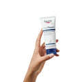 Eucerin UreaRepair 10% Urea Foot Cream 100ml in hand